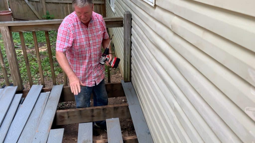 man showing floor joists